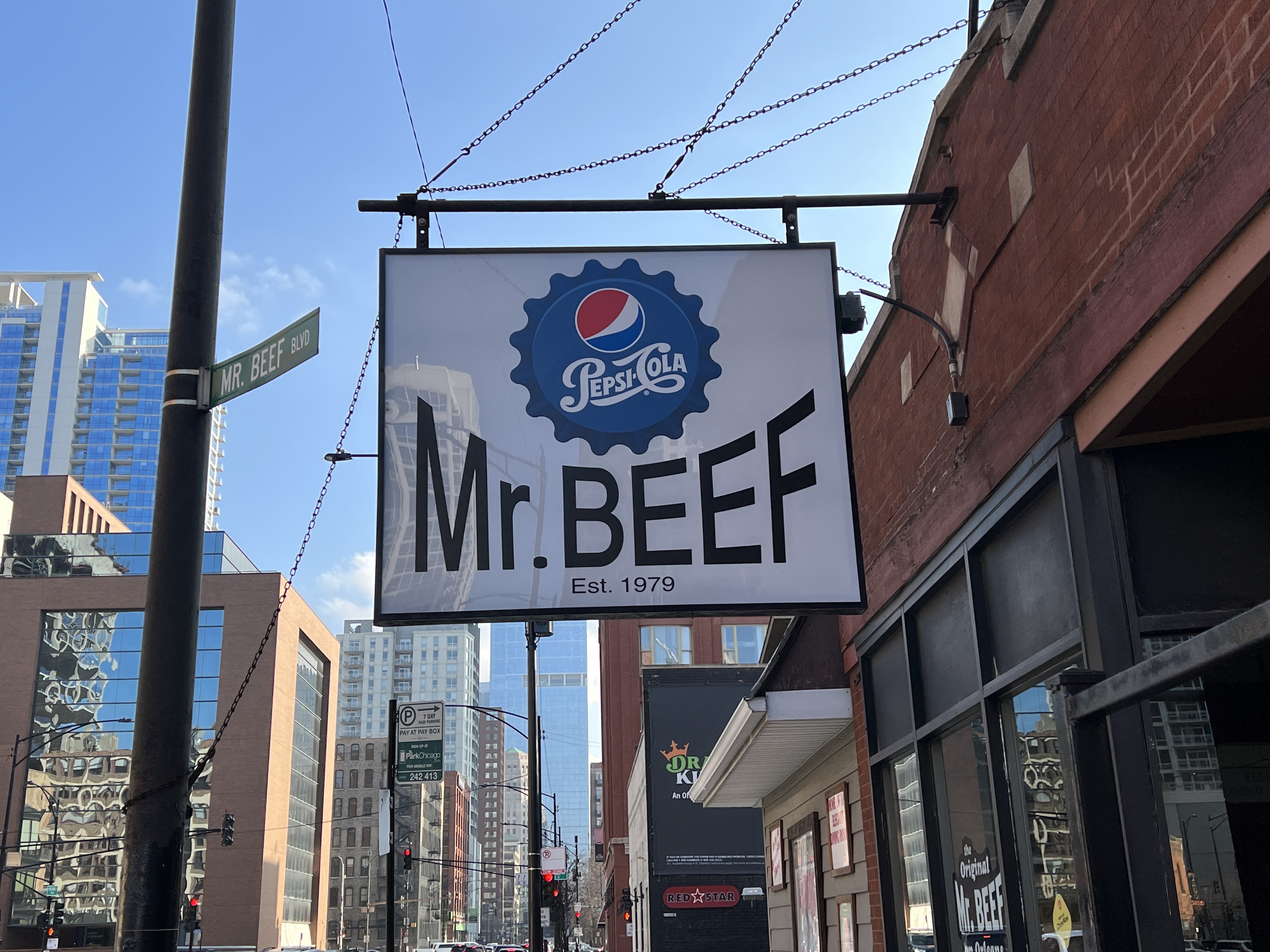 An Italian beef sign reading, “Mr. Beef.”